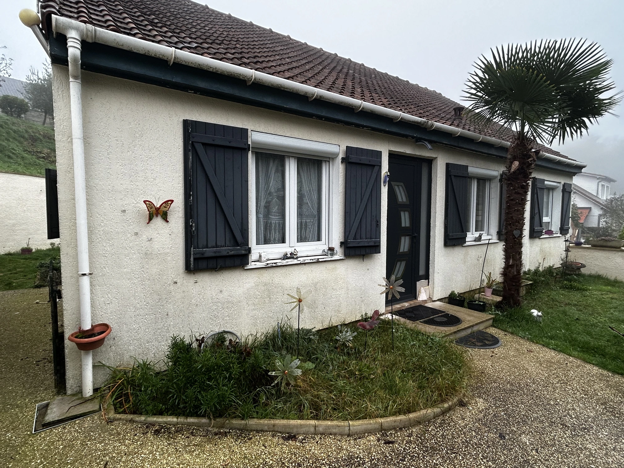 Ravalement de façade et réparation d'ossature bois d'une maison individuelle à Croissy-sur-Seine (78)