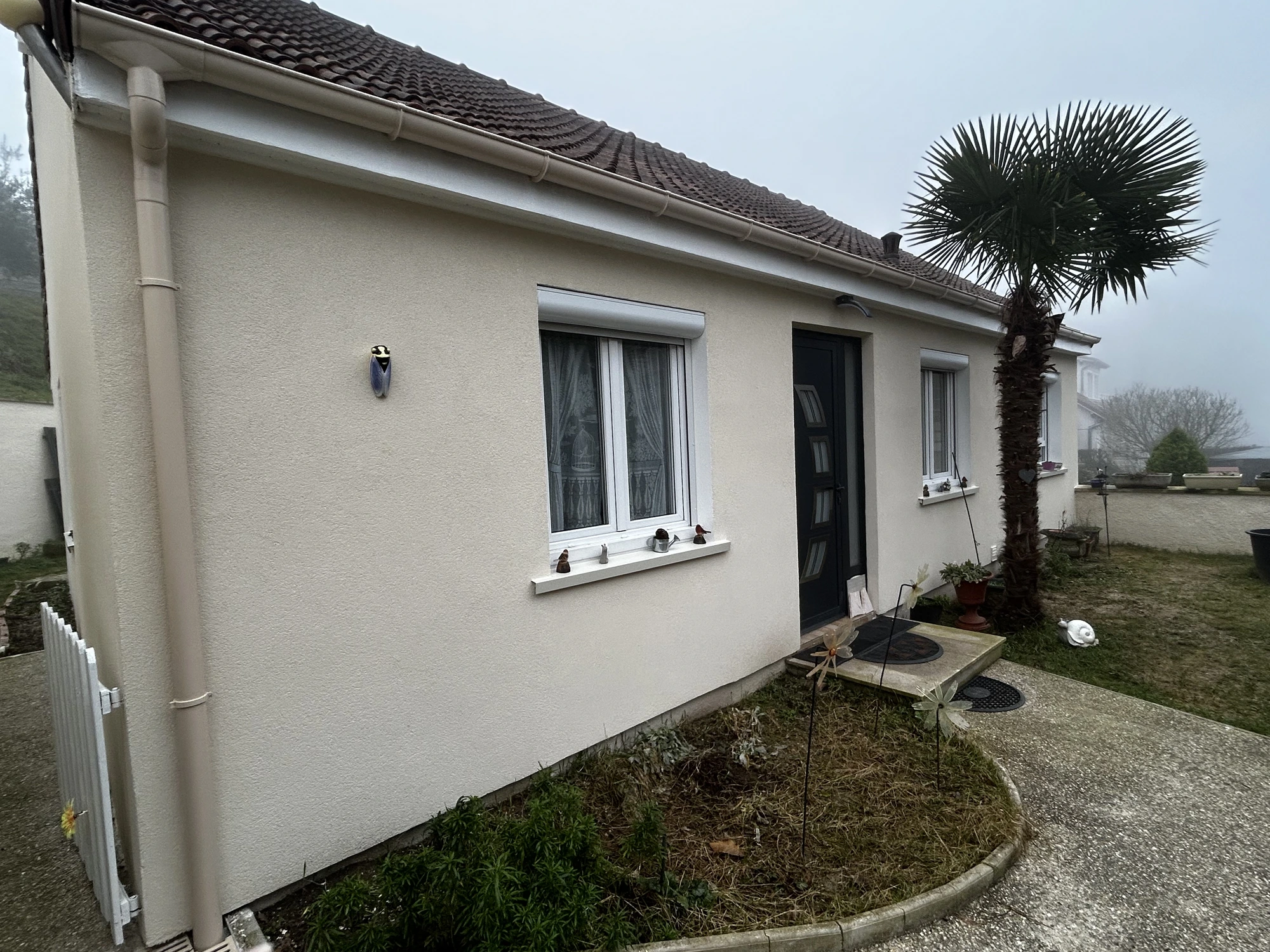 Façade talochée à l'enduit STO Stolit K après ravalement D3 armé d'une maison à Croissy-sur-Seine